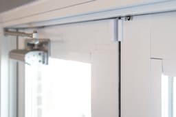 Door sensor installed on a commercial door