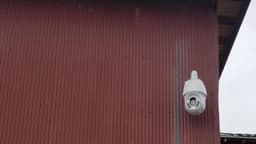 The Lookout mounted on metal siding with the wall bracket.