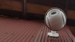The Lookout mounted on metal siding with the wall bracket. (looking up)