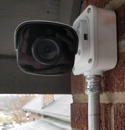 A Warrior installed on brick with the electrical mounting box and conduit