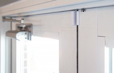 Door sensor installed on a commercial door