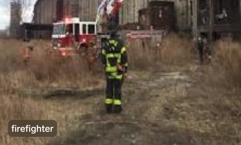 person in firefighter uniform